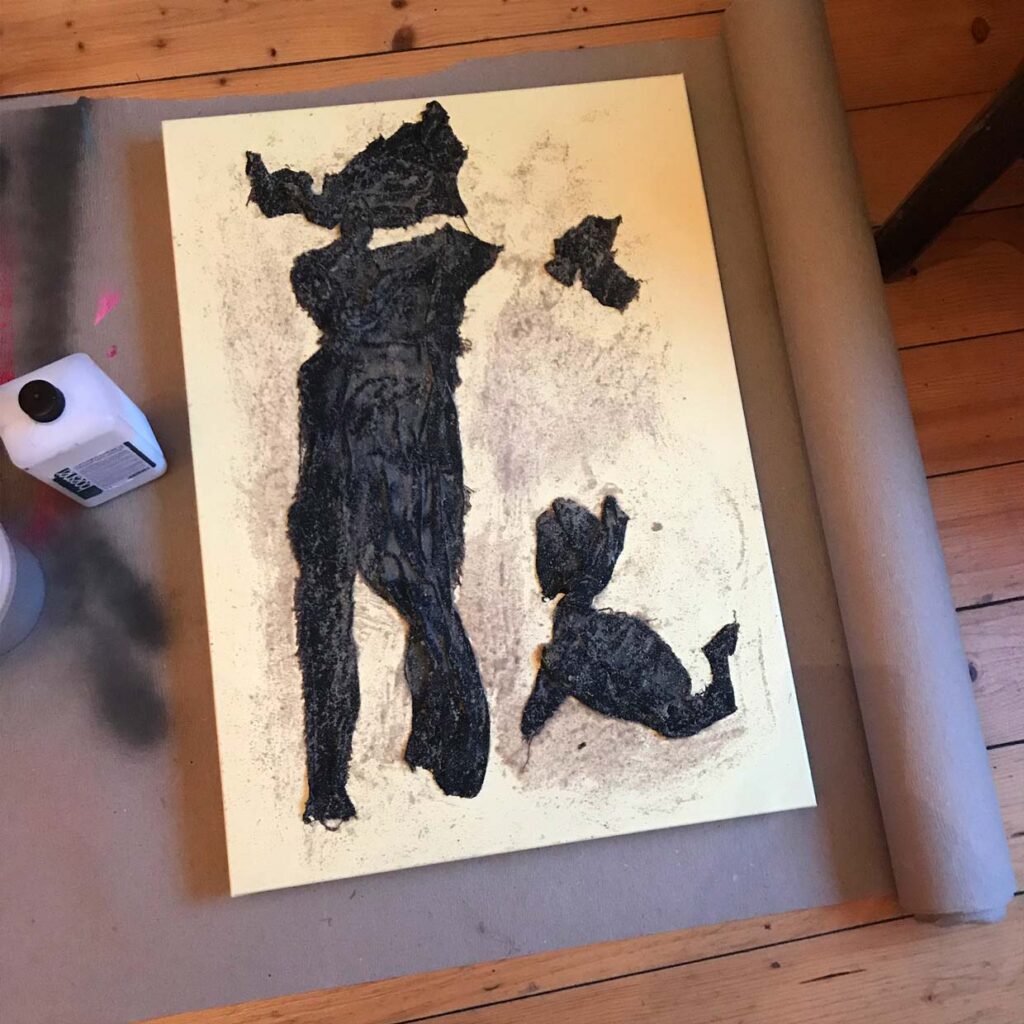 SKARSKY.ART - Upcycling - Small doggie playing with it's owner